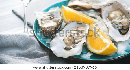 Similar – Image, Stock Photo Fresh oysters with lemons in restaurant