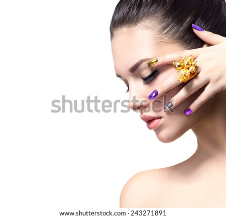 Fashion Beauty. Manicure and Make-up. Nail art. Beautiful Woman With Colorful Nails and Luxury Makeup. Beautiful Girl Face and Hand. Isolated on white background