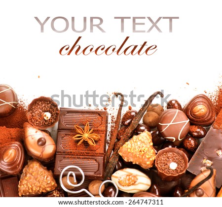 Chocolates border isolated on white background. Chocolate. Assortment of fine chocolates in white, dark, and milk chocolate. Variety of Praline Chocolate sweets
