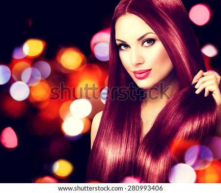 Beauty Model girl with Healthy Brown Hair. Beautiful brunette woman touching her long smooth shiny straight hair. Hairstyle. Hair cosmetics, haircare. Hair care, extensions