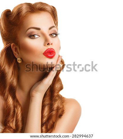 Retro woman with Red Hair. Beauty portrait isolated on white background. Beautiful Vintage styled girl. Perfect makeup and hairstyle. Gorgeous model lady. Red Lips. Luxury Make up. Vogue Style
