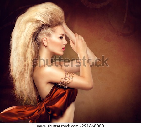 High Fashion Model Girl with Mohawk hairstyle. Beauty woman with glamour updo hair style. Blonde Slim Lady