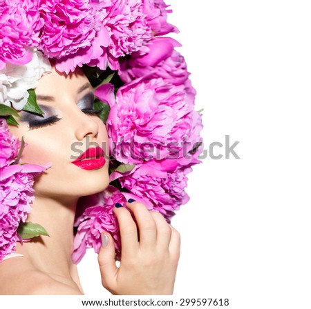 Beauty High Fashion Model Girl with pink Peony hair style. Vivid Make up. Beautiful Model woman with Blooming flowers on head. Nature Hairstyle.  Holiday Creative Makeup. Isolated on white background