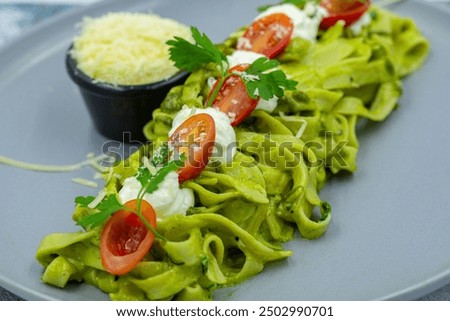 Similar – Image, Stock Photo Zucchini raw vegan pasta with assorted vegetables. Vegan food