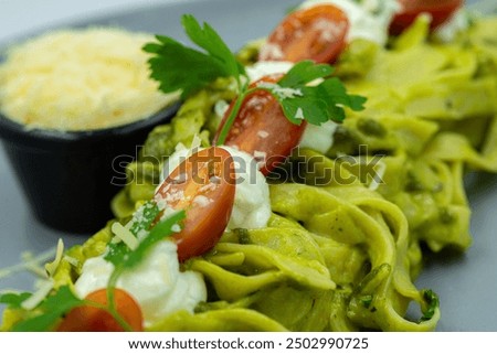 Similar – Image, Stock Photo Zucchini raw vegan pasta with assorted vegetables. Vegan food