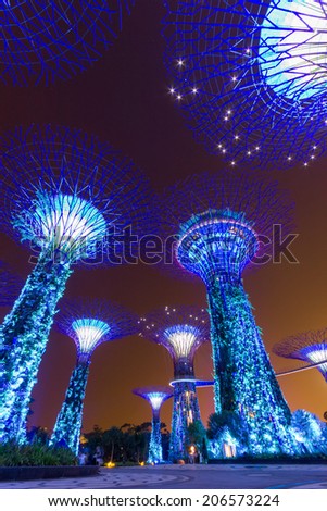 SINGAPORE - JULY 17: Nightview of The Supertree Grove at Gardens by the Bay on July 17, 2014 in Singapore. Spanning 101 hectares, and five-minute walk from Bayfront MRT Station.