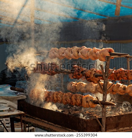 Traditional chicken barbecue on charcoal grill with beautiful smell