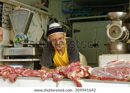 Casablanca,Morocco - August 3, 2015 : Unidentified Butcher and the meats displayed in the butcher shop in the traditional Medina of Moroccan cities
