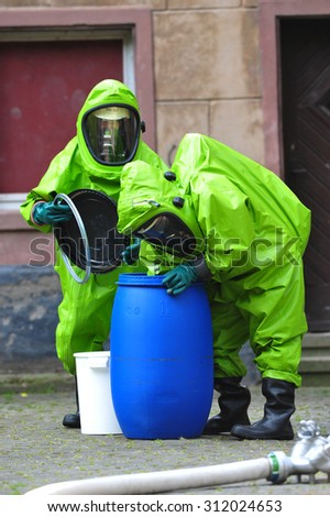Frankfurt, Germany - July 1, 2009 - Chemical experts exploring site at school after accident