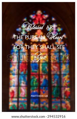 Inspirational religious quote with words Blessed are the pure of heart on background of stained-glass window inside the church