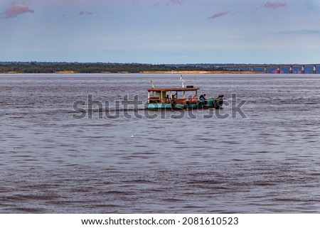 A small boat sailing on a river in the Amazon Zdjęcia stock © 