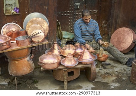 FEZ, MOROCCO - FEBRUARY 28: Unidentified brass worker at Seffarine Square, Fez, on February 28, 2015 Morocco