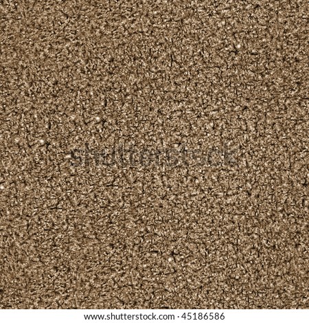 This is a seamless pattern texture background of corkboard. This is a photographic image. This also looks like brown carpet.