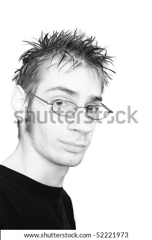 Highkey black and white portrait of a young adult with a cliche look of a tech (spiky hair and glasses) isolated on white background