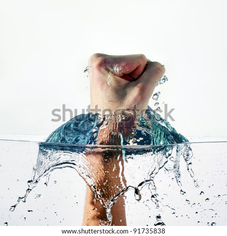 An Angry Fist Punching Water Isolated On White Background Stock Photo ...