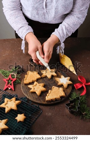 Similar – Image, Stock Photo Cheerful woman preparing paint during renovation