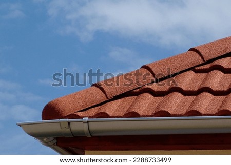 Similar – Image, Stock Photo Red-brown curved roof tiles on the roof of an old building with chimney in the sunshine in Oerlinghausen near Bielefeld on the Hermannsweg in the Teutoburg Forest in East Westphalia-Lippe