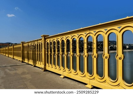 Similar – Image, Stock Photo The cast iron banister conjures up a bizarre shadow on the terrazzo steps
