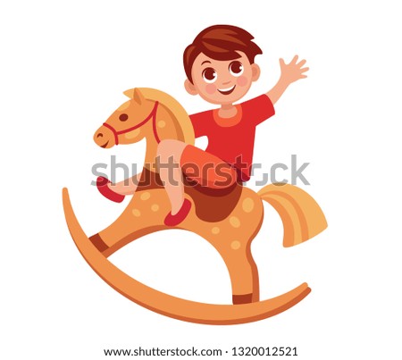 happy boy swinging on toy horse