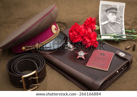 Still life with vintage objects dedicated to Victory Day. Order of the Red Star.