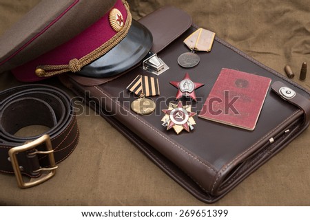 Still life with vintage objects dedicated to Victory Day. Medals and orders of Great Patriotic war.