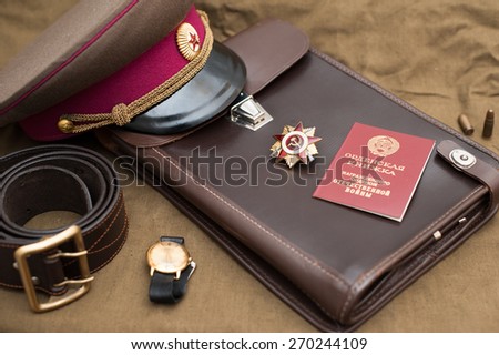 Still life with vintage objects dedicated to Victory Day. Order of the patriotic war 1st class. May 9
