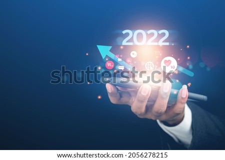 Trends of online businesses using smartphones in 2022, buying and selling products via the internet technology network.
