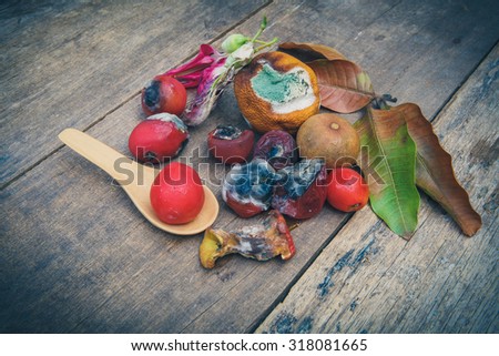 Rotten Vegetables on old wooden. still life style