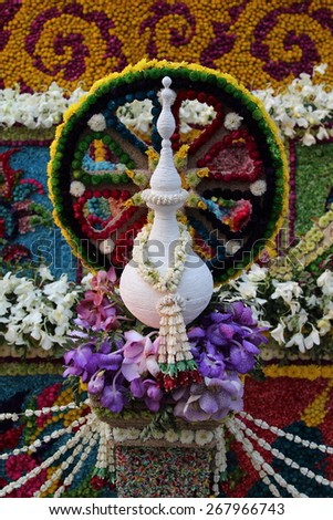 Thai style flower garland hang on white jug, The 39th Chiang Mai Flower Festival 2015.