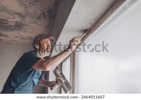 Similar – Image, Stock Photo Plasterer renovating indoor walls and ceilings.