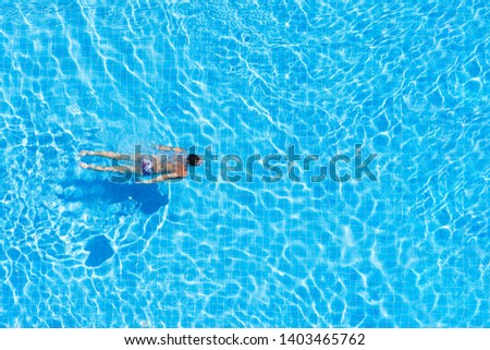 Similar – Image, Stock Photo Man swimming under water in sea