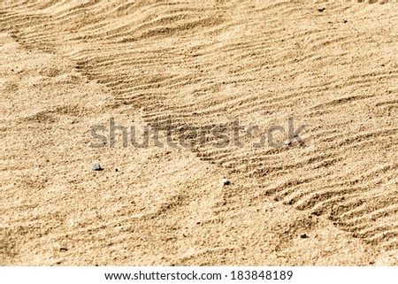 Brushed wavy beach sand texture