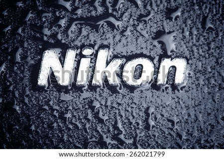 KAZAN, RUSSIA, 15 March 2015: water drops on the Nikonr logo