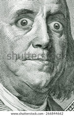 The president\'s face with a dollar bill with big eyes