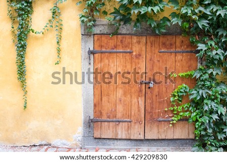 Similar – Image, Stock Photo old closed shutters with flaking white lacquer and rusty hinges in brick facade with partly missing plaster that have seen better days ;old