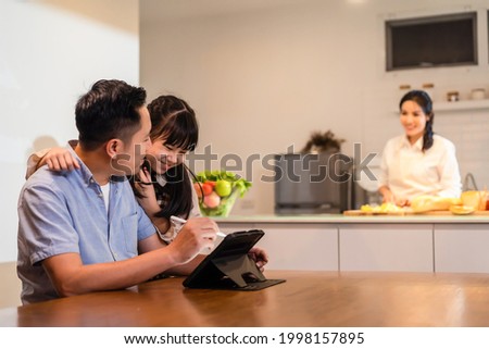 Similar – Image, Stock Photo Dad working on laptop with child sitting on his lap