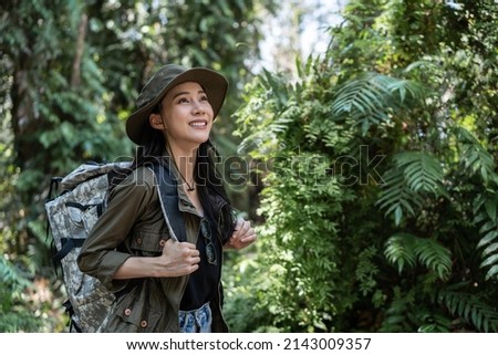 Similar – Image, Stock Photo Female tourist at wild rocky beach and coastline of surf spot La Santa Lanzarote, Canary Islands, Spain. La Santa village and volcano mountain in background