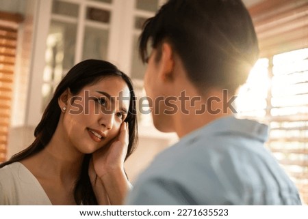 Similar – Image, Stock Photo Loving couple looking at each other