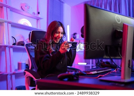 Similar – Image, Stock Photo Gamer playing video game at home