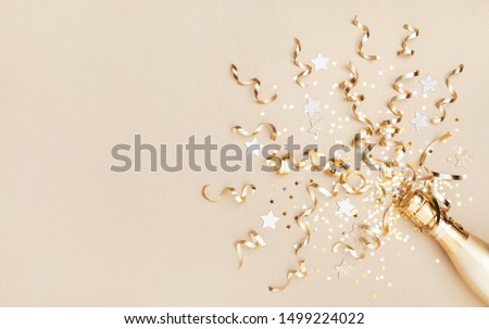 Similar – Image, Stock Photo Champagne bottle and confetti flow on pink