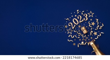 Similar – Image, Stock Photo Champagne bottle and confetti flow on pink