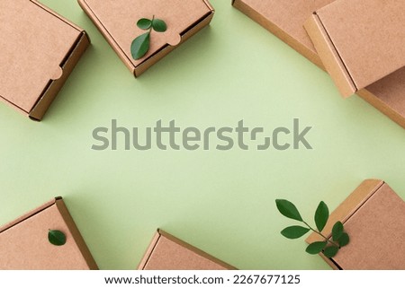 Similar – Image, Stock Photo Gift box with green ribbon on and candy canes on red bold color background