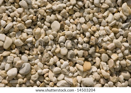 Background image of small off white pebbles.