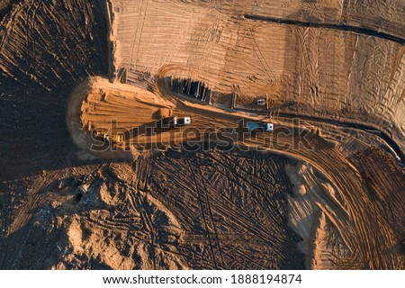 Construction of an embankment during the reclamation of a garbage dump Imagine de stoc © 