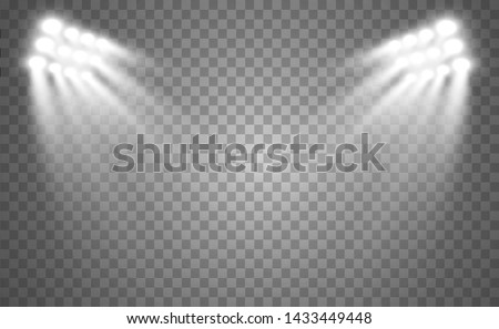 	
Stadium floodlights brightly illuminate evening or night sports games, concerts, shows, events. Isolated on a transparent background. Arenas of bright spotlights. Bright lights. Illuminated scene.