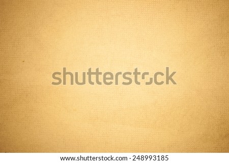 Textured recycling paper brown background.