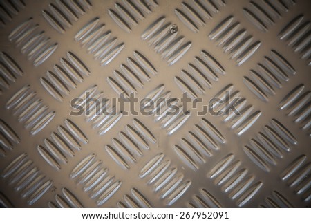 Stainless steel with non slip pattern.