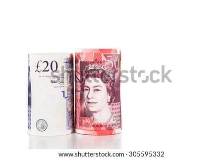 Close up of rolled up British Pound Sterling currency note.