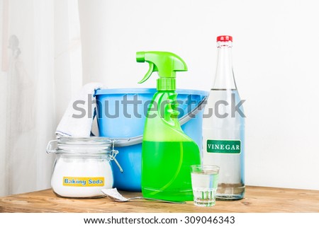 Low angle view of baking soda with vinegar, natural mix for effective house cleaning