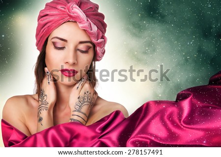 beautiful stylish woman in oriental style in turban